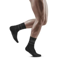 CEP Reflective Mid Cut Compressiesokken - Zwart -Sportwinkel cep reflective mid cut compression socks black 22 1553023