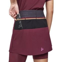 CRAFT Pro Trail 2-in-1 Dames Skirt - Punsch -Sportwinkel craft pro trail womens 2 in 1 skirt punsch 2 1552645