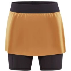 CRAFT Pro Trail 2-in-1 Dames Skirt - Desert-Slate -Sportwinkel craft pro trail womens 2 in 1 skort desert slate 1 1418568