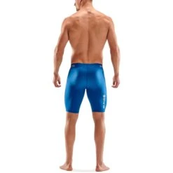 SKINS 1-Series Half Tights - Bright Blue -Sportwinkel skins compression 1 series half tights bright blue 3 1131216