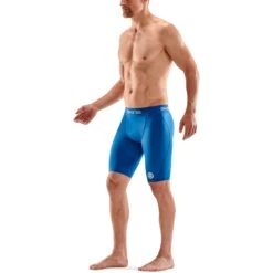 SKINS 1-Series Half Tights - Bright Blue -Sportwinkel skins compression 1 series half tights bright blue 4 1131217
