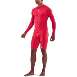 SKINS 1-Series Shirt Met Lange Mouwen - Rood -Sportwinkel skins compression 1 series men long sleeve top red 4 941237