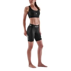 SKINS 1-Series Half Tights Dames - Zwart -Sportwinkel skins compression 1 series women half tights black 4 892973