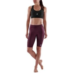 SKINS Compression 3-Series Fitness Half Tights Dames - Burgundy -Sportwinkel skins compression 3 series women half tights burgundy 3 941758