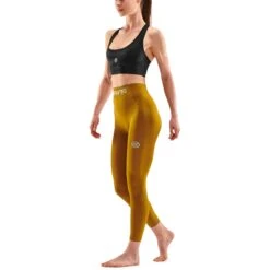 SKINS Compression Dames 3-Series Naadloze Long Tights - Bronze -Sportwinkel skins compression women 3 series seamless long tights bronze 5 1131493